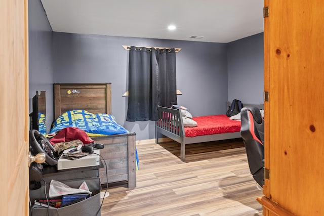 bedroom featuring light wood-type flooring