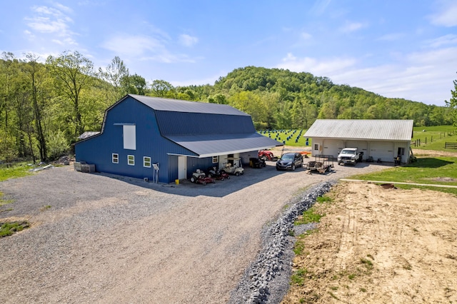 exterior space featuring an outbuilding