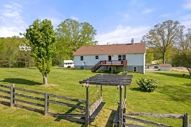 view of yard with a deck