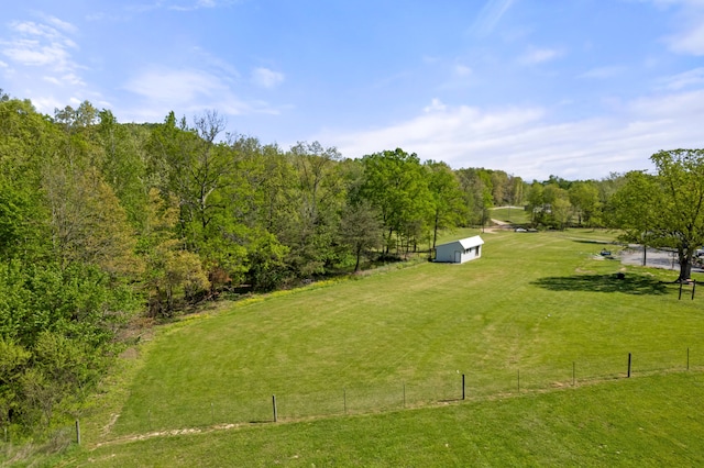 exterior space with a yard and a rural view