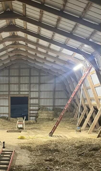 misc room featuring lofted ceiling