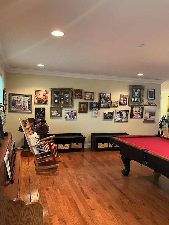 rec room with hardwood / wood-style floors, crown molding, and billiards