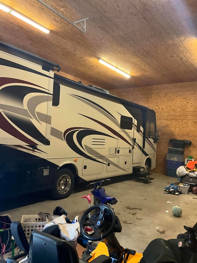 garage featuring wooden ceiling