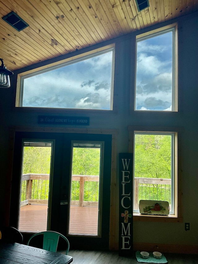 entryway with a healthy amount of sunlight and wood ceiling