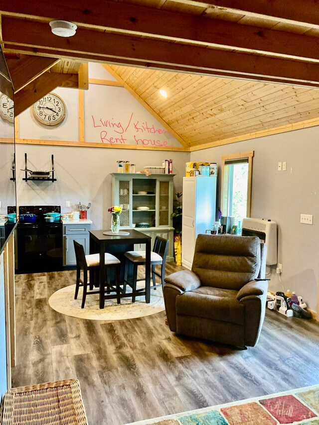 living room featuring wooden ceiling, wood-type flooring, and lofted ceiling with beams