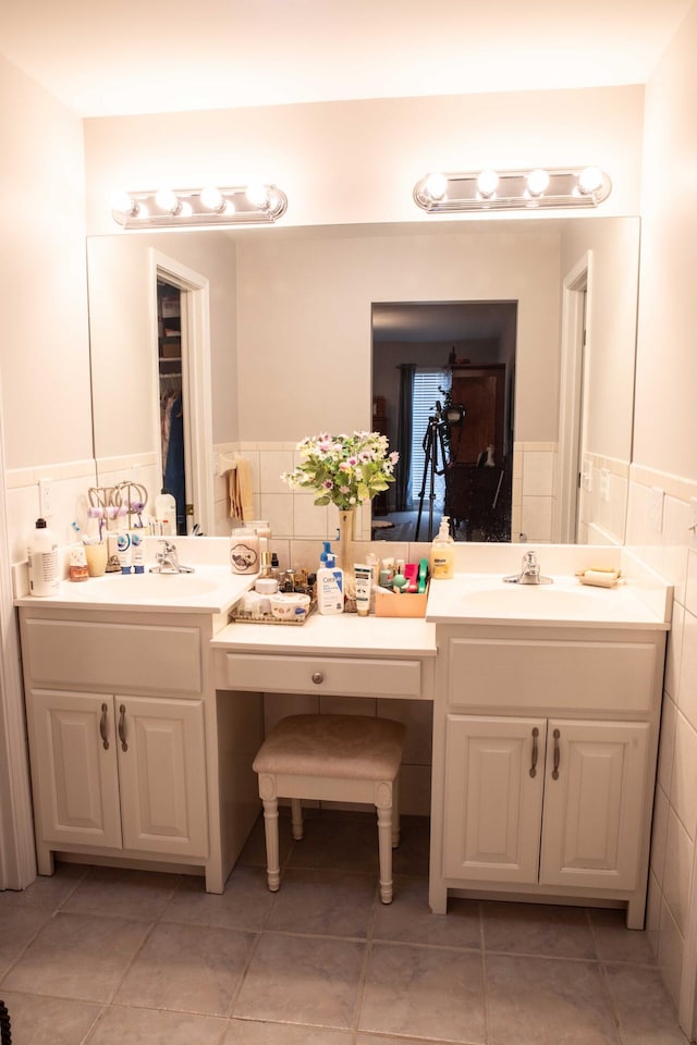 bathroom featuring vanity and tile floors