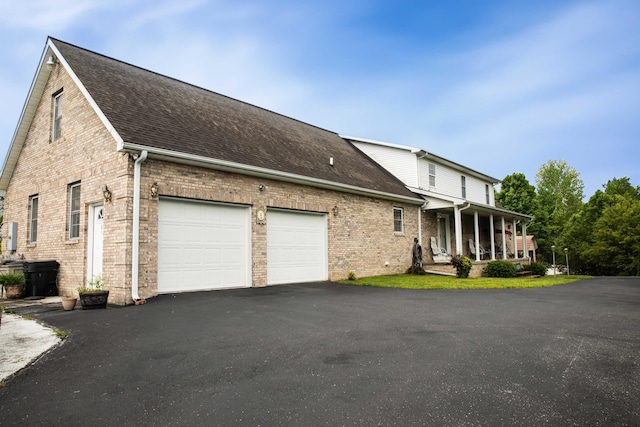 exterior space with a garage