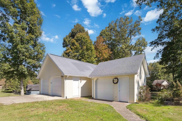 garage with a yard