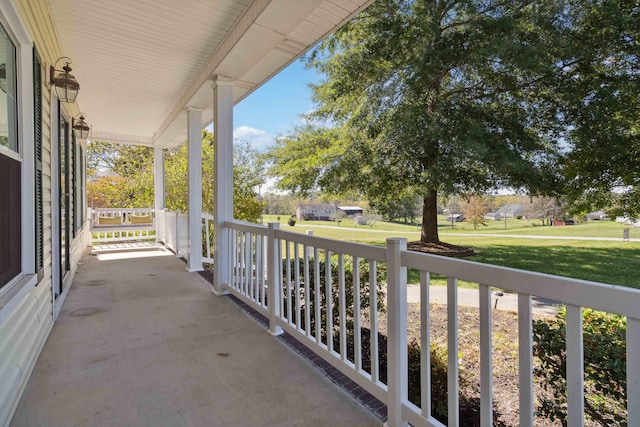 balcony featuring a porch