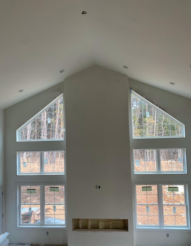 interior space with high vaulted ceiling