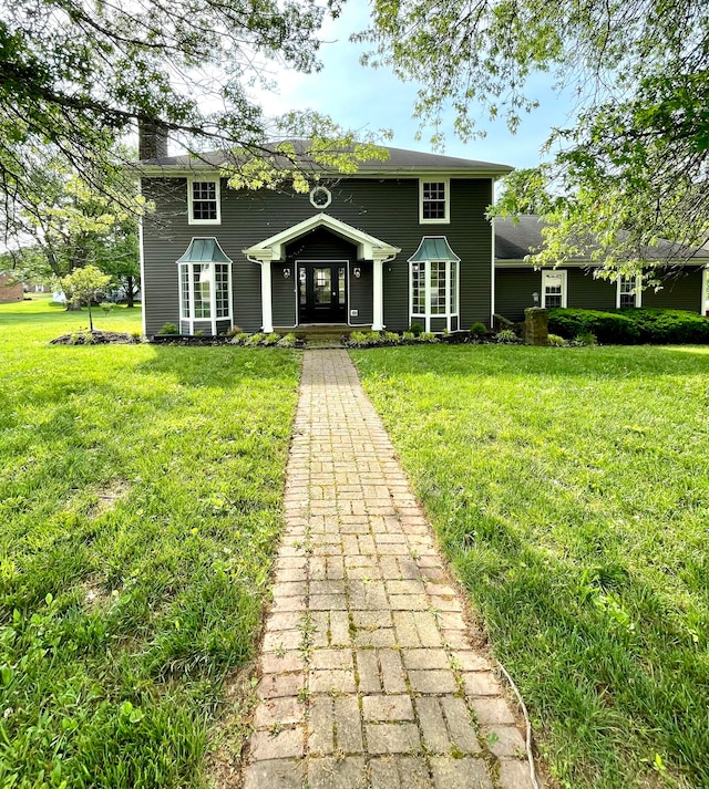 view of front of house with a front lawn