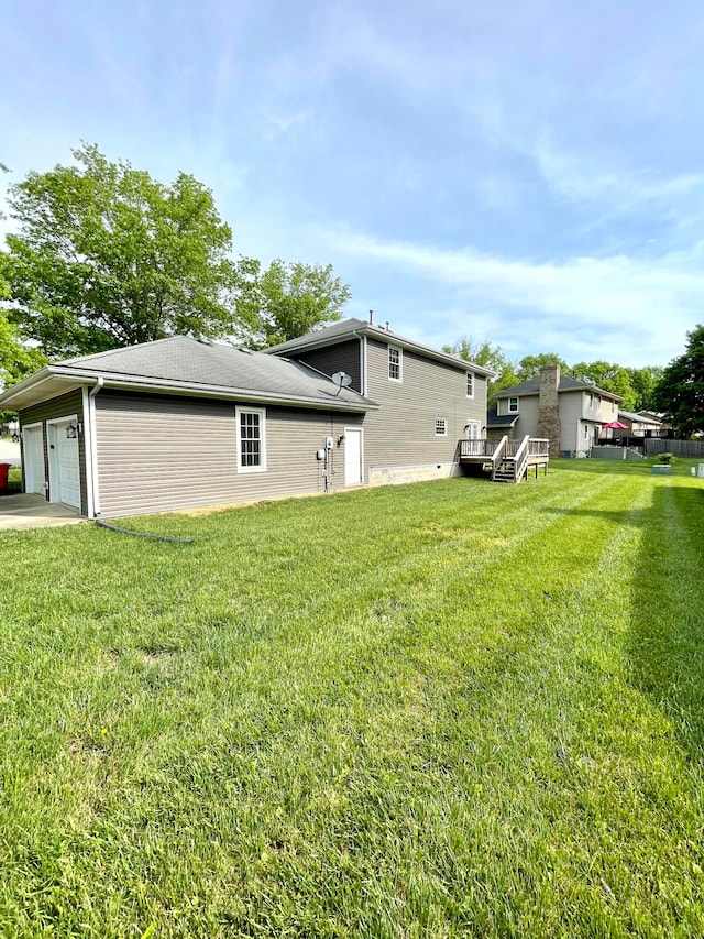 view of yard featuring a garage