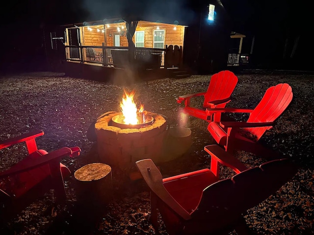 exterior space with a fire pit