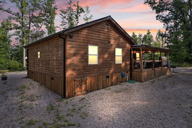 view of property exterior at dusk