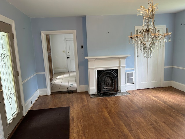 unfurnished living room featuring tile floors and a chandelier