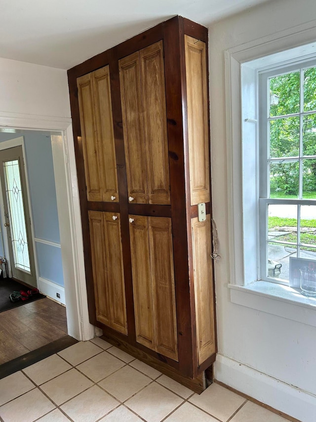 interior details with light tile floors