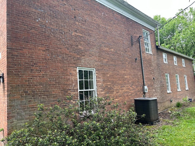 view of home's exterior featuring central air condition unit