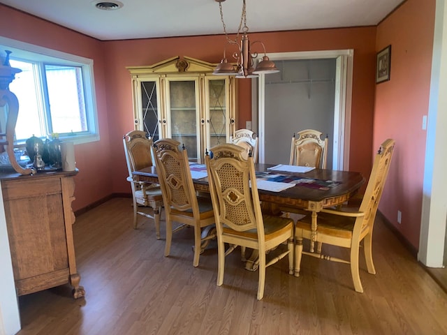 dining area featuring hardwood / wood-style flooring