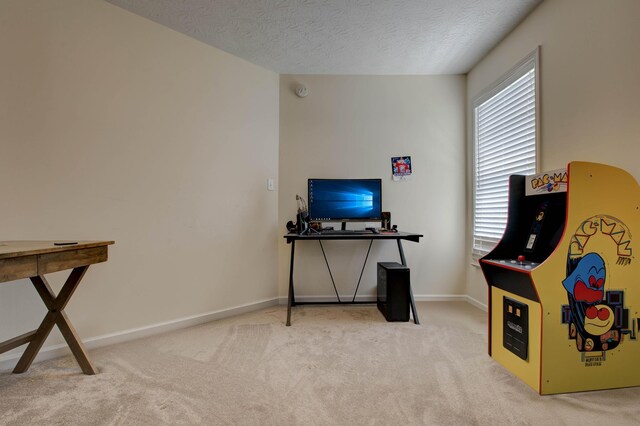 interior space featuring a textured ceiling and light colored carpet