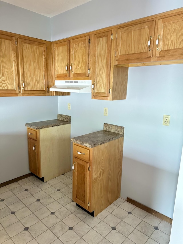 kitchen with light tile floors