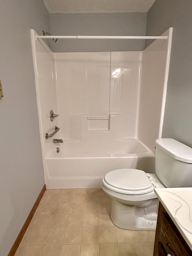 full bathroom featuring tile flooring, vanity, bathtub / shower combination, and toilet