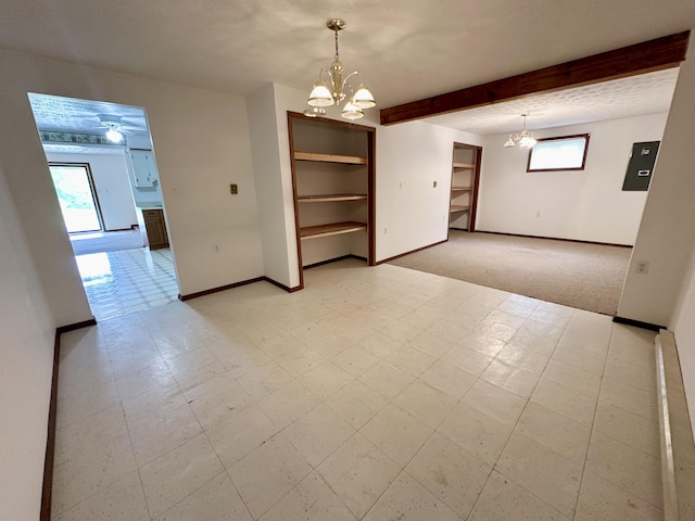 tiled empty room with beam ceiling and a chandelier