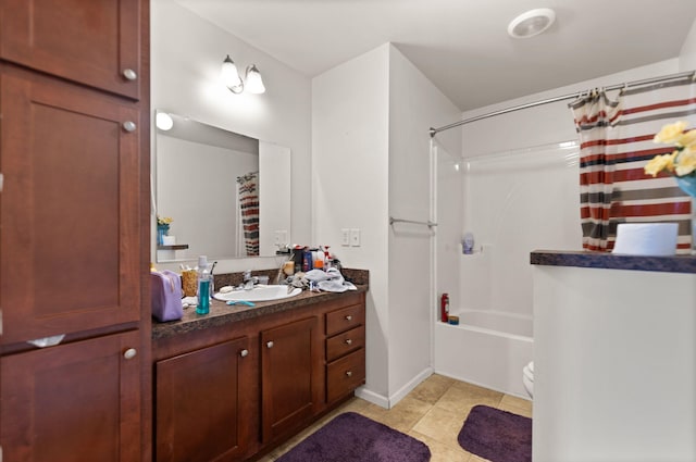 full bathroom featuring vanity, toilet, shower / tub combo, and tile patterned flooring