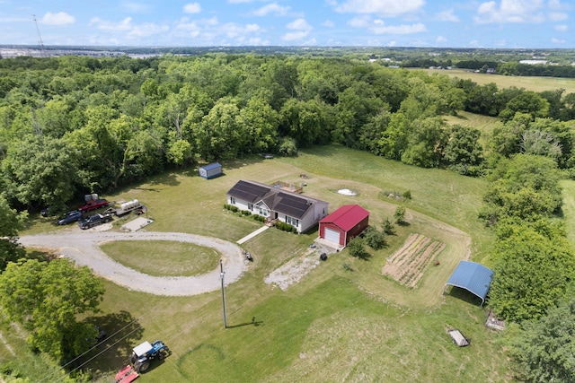 birds eye view of property featuring a rural view