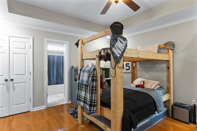 bedroom featuring tile flooring and ceiling fan