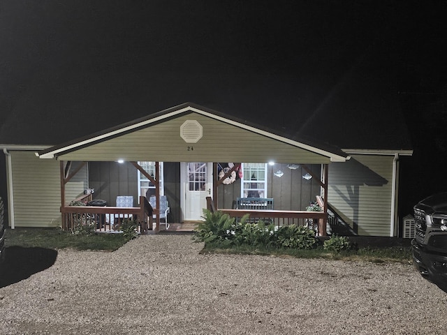 ranch-style house featuring a porch