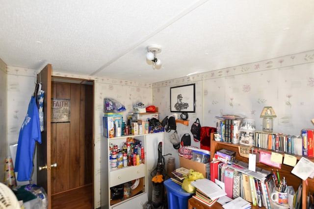 miscellaneous room featuring a textured ceiling