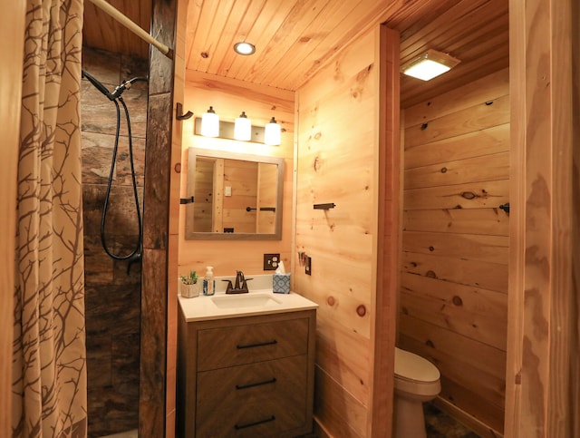 bathroom featuring walk in shower, vanity, toilet, and wooden ceiling