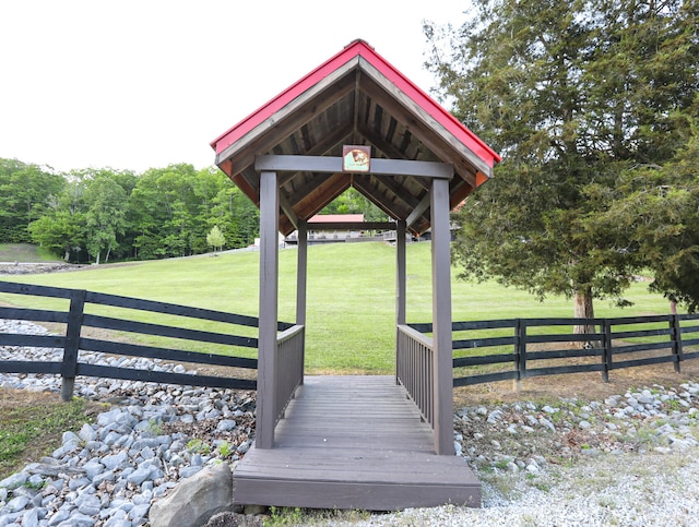 view of home's community with a gazebo and a yard