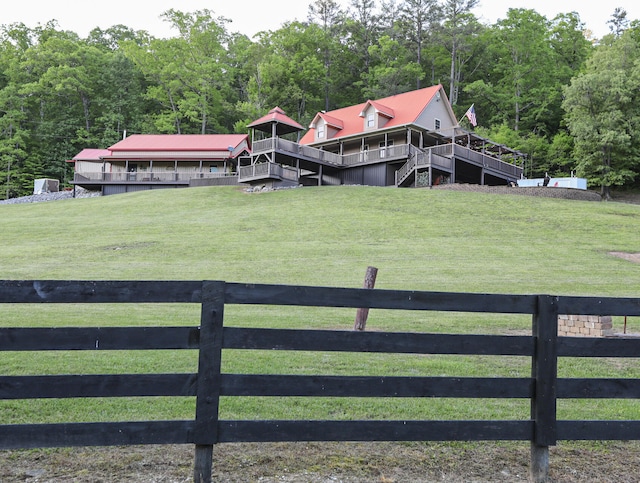 view of yard with a rural view