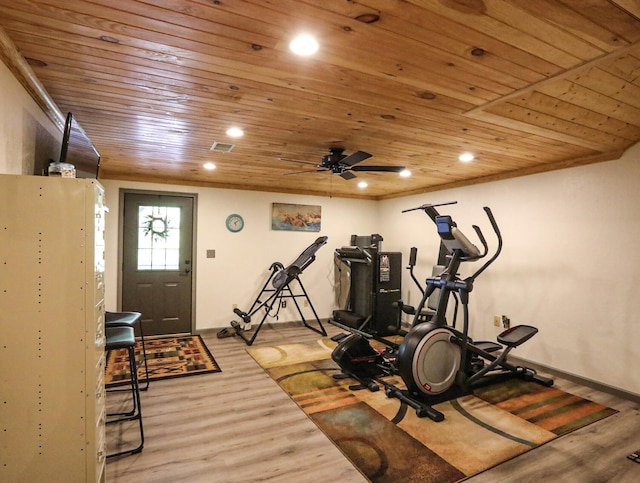 exercise area with wood ceiling, light hardwood / wood-style floors, and ceiling fan