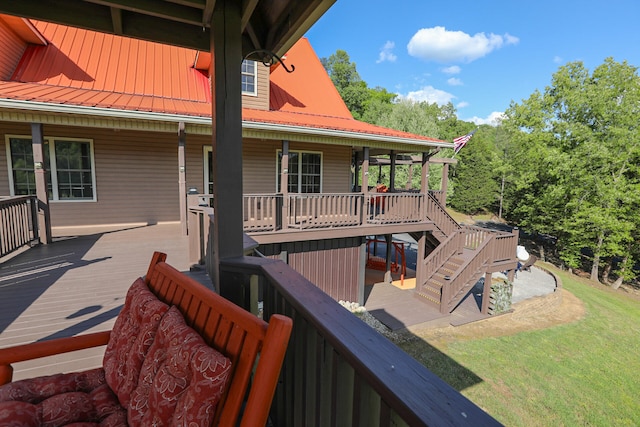 wooden deck with a yard