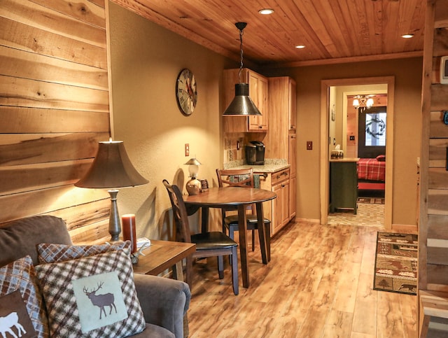 interior space featuring wood ceiling and light hardwood / wood-style flooring