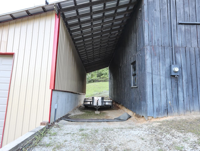 view of side of property with a garage