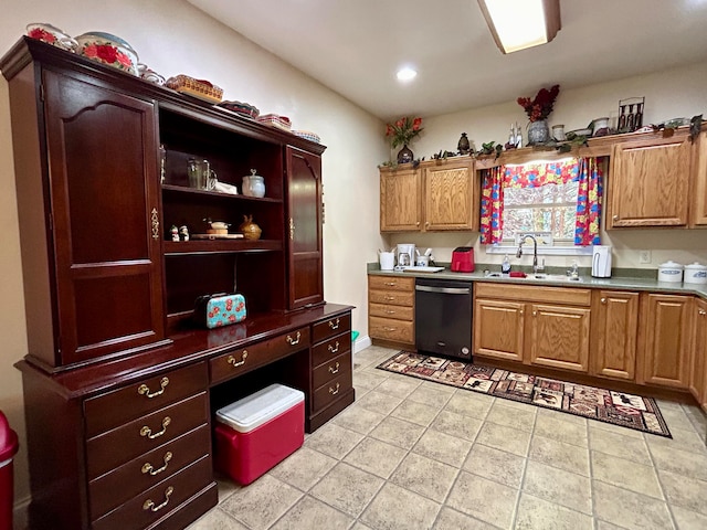 kitchen with dishwasher, sink, and light tile floors