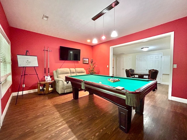 recreation room with a textured ceiling, dark wood-type flooring, and billiards