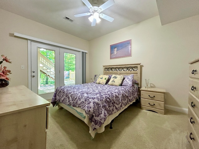 carpeted bedroom featuring ceiling fan and access to outside