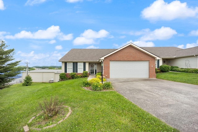 ranch-style house with a front lawn and a garage