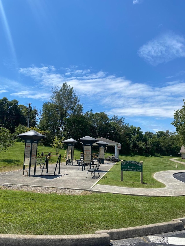 view of property's community with a yard and a gazebo