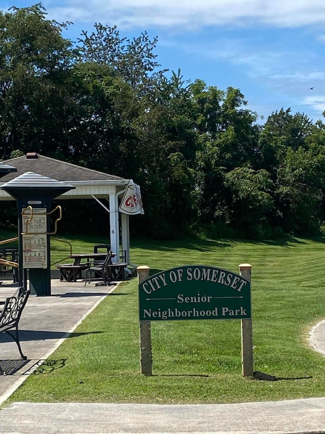 view of property's community featuring a gazebo and a lawn