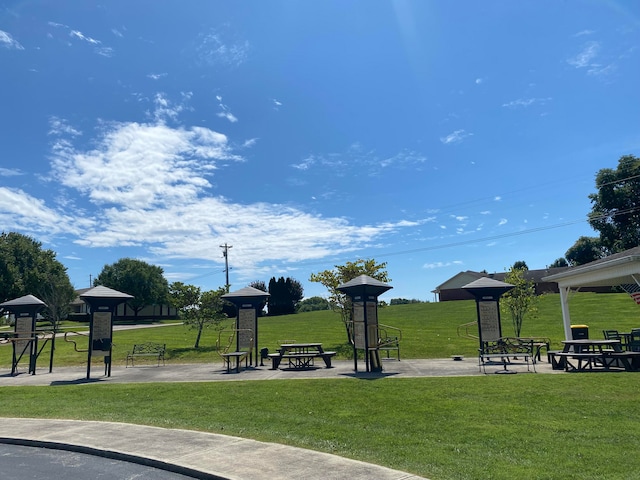 view of community featuring a gazebo and a lawn