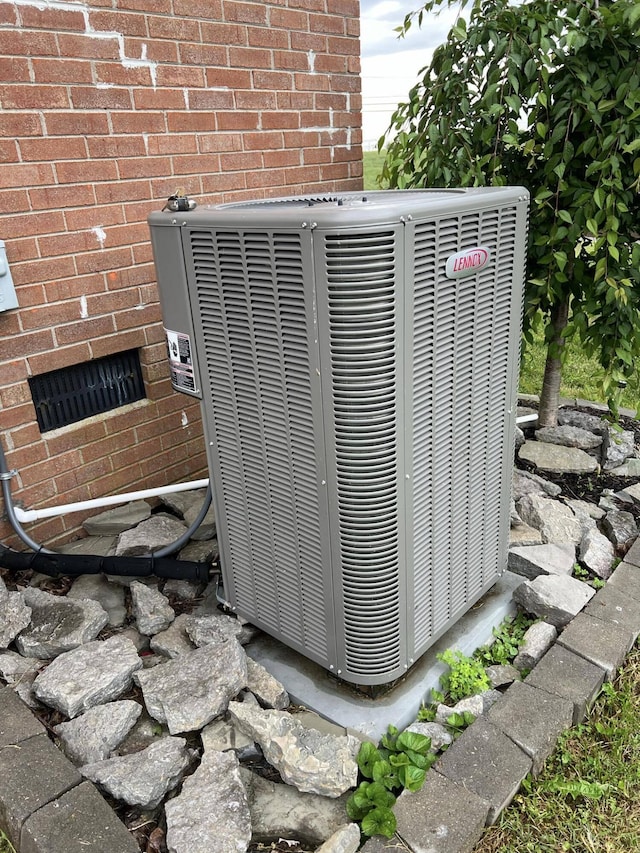 4104 Brooksville-Germantown Rd, Augusta, KY 41002 - exterior view of central air condition unit and brick siding