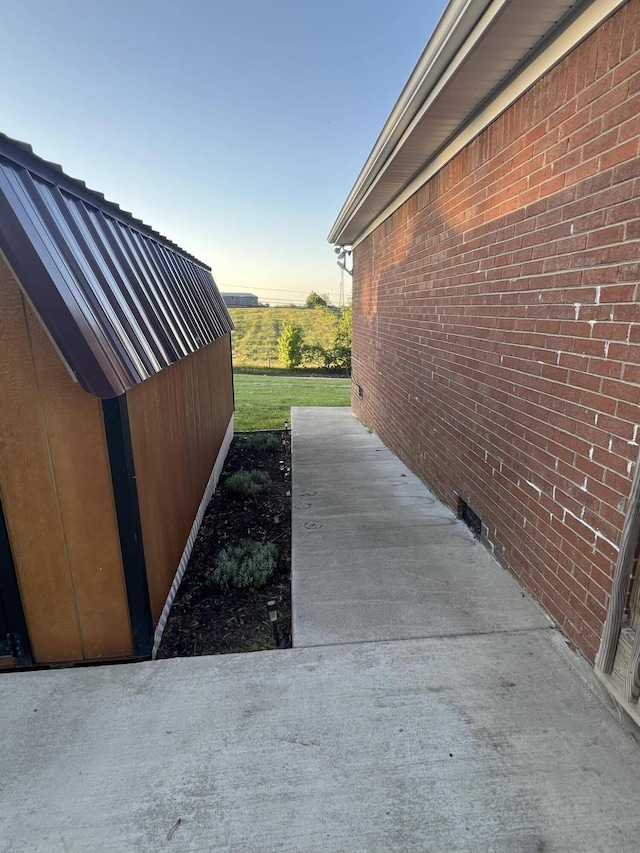 view of property exterior at dusk