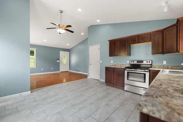 kitchen with sink, light hardwood / wood-style flooring, ceiling fan, high vaulted ceiling, and stainless steel electric range oven