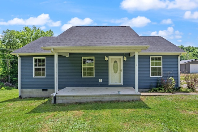 view of front of home with a front yard and a porch