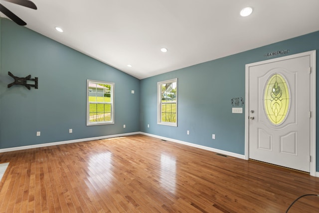 entryway featuring hardwood / wood-style flooring, ceiling fan, and vaulted ceiling